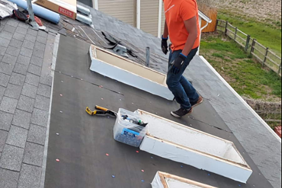 roofers installing roof skylights